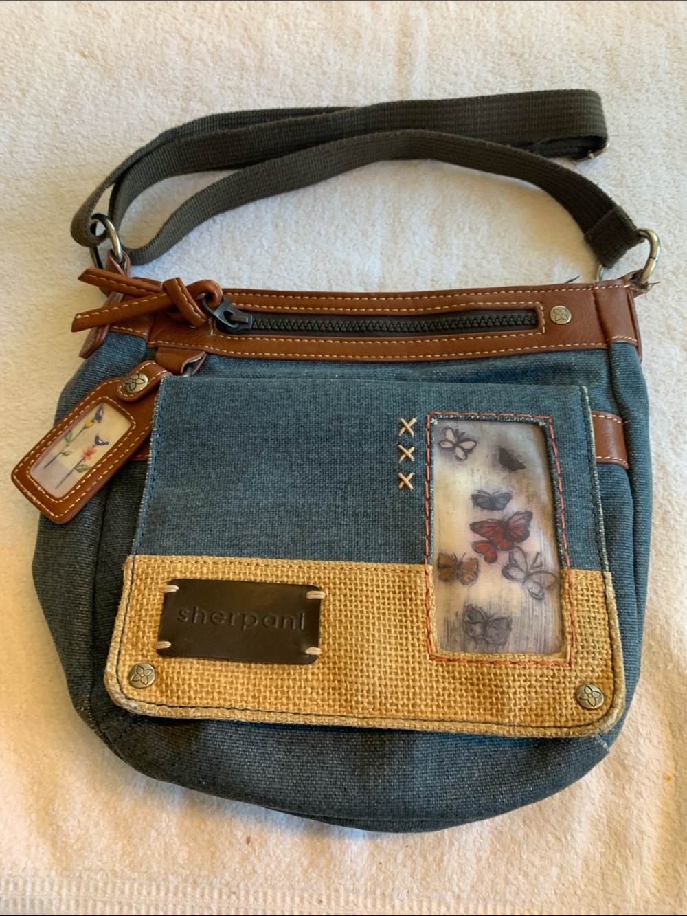 Sherpani Blue Crossbody Bag with Brown leather and tan highlights
